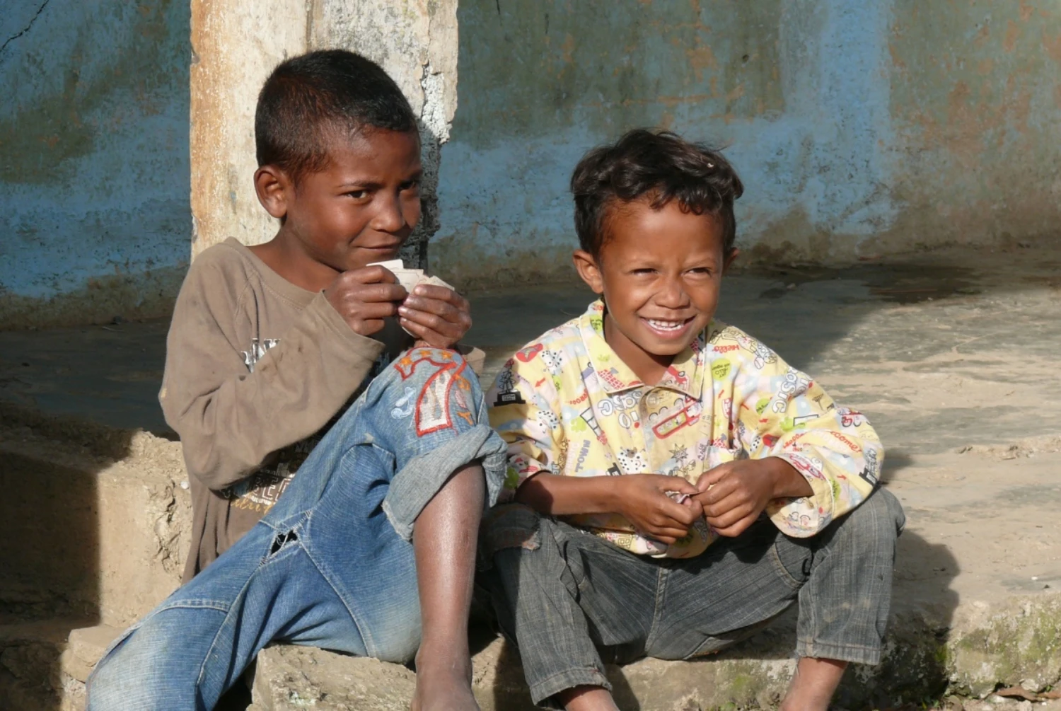 Two boys sitting in Maubisse